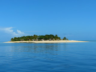 photo picture of a beautiful sea and ocean view with a natural background of rocks, forests and mountains