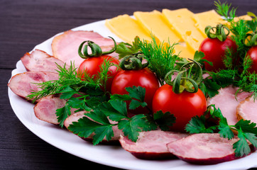 Homemade sausage with meat and greens. Restaurant decoration dishes