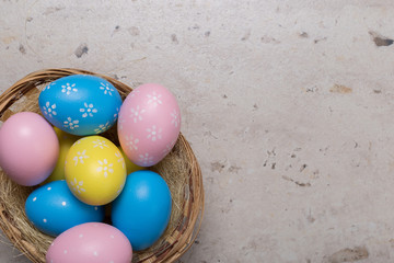 Fototapeta na wymiar Happy Easter concept background.Easter eggs on table.