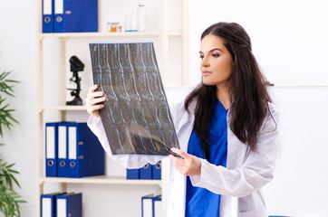Female doctor radiologist working in the clinic 
