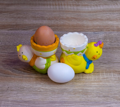 Two eggs and two egg stands