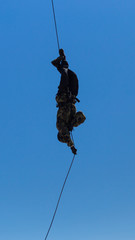 Special Forces descend on a rope