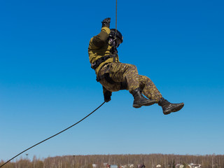 Special Forces descend on a rope