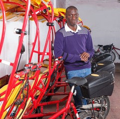 African-American man recommending rickshaw