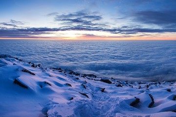 Winter High Tatras mountain range panorama with many peaks and clear sky from Slavkovsky peak....