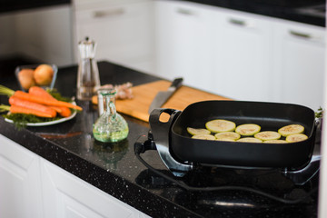 Roasted zucchini in the  frying pan