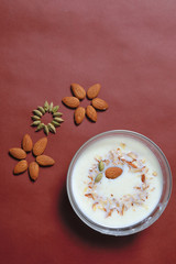 Almond And Cardamom design with sweet dish in bowl