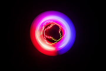 Concept of speed - Trail of fire and smoke - Vinyl record. Burning vinyl disk. Turntable vinyl record player. Retro audio equipment for disc jockey. Sound technology