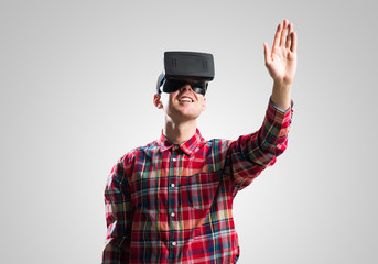 Guy in mask experiencing virtual reality as new entertainment device