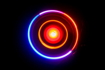 Concept of speed - Trail of fire and smoke - Vinyl record. Burning vinyl disk. Turntable vinyl record player. Retro audio equipment for disc jockey. Sound technology