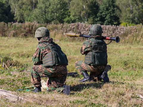 A soldier shoots an RPG-7
