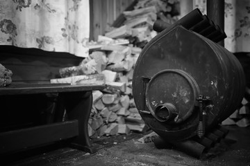 Wood burning stove. Firewood for furnace heating. Warehouse for firewood for the stove.