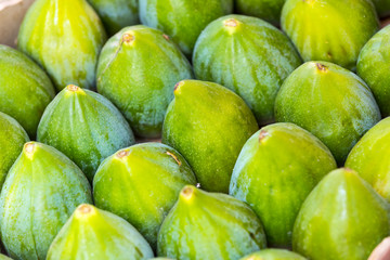 Background ripe figs without GMOs on the market in Milan, Italy.