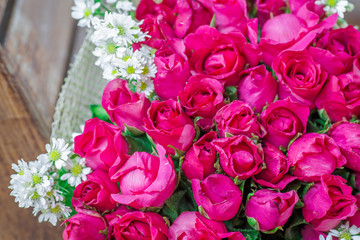 Wallpaper of flowers (roses) that are placed on chairs or wooden tables, to be displayed at festivals or on special occasions (Valentine, wedding, birthday, new year) 