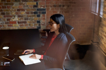 Professional Asian businesswoman in an office
