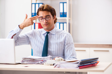 Businessman disgusted with cockroaches in the office