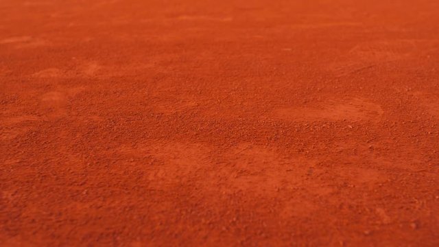 Background of red clay tennis court, dolly, 4k, slow motion 75fps