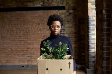 Portrait of a black African businesswoman starting a new job