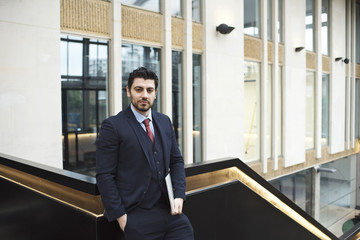 Saudi Arabian businessman in an airport business lounge