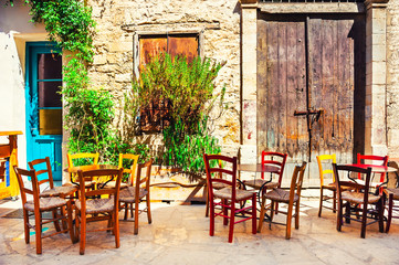 Fototapeta na wymiar Cafe on the old street in Limassol, Cyprus.