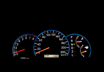 Car dashboard indicators on black panel