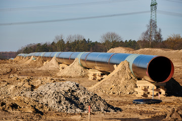Construction site of the European natural gas pipeline EUGAL near Wrangelsburg (Germany) on 16.02.2019, this pipeline begins in Lubmin at the landing site of the Nord Stream 1 and 2 Pipline. - obrazy, fototapety, plakaty