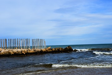 Fototapeta na wymiar A Breakwater on a Valencian Beach
