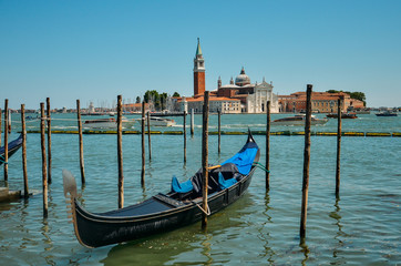 Gondola in Venice. Church of San Giorgio Maggiore with gondolas, Venice, Italy