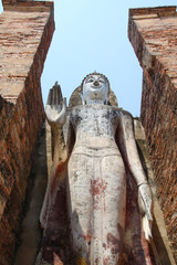 standing big buddha statue in Ayutthaya