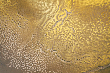 Aerial view of surrealistic industrial place. Human impact on the environment. View from above. Photo captured with drone.