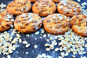Homemade oat cookies on a dark background