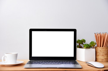 blank screen Modern laptop computer with mouse,Smart phone and Succulent on wood table in office view backgrounds