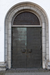 Heavy metal door of an old church 
