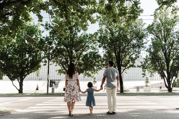 Smiling happy family and young funny daughter. Family concept.