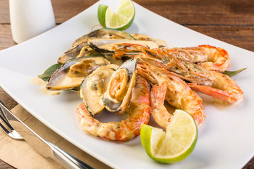 Shrimps and mussels in a creamy sauce, ready-made dish, Asian cuisine, seafood, menu, restaurant