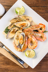 Shrimps and mussels in a creamy sauce, ready-made dish, Asian cuisine, seafood, menu, restaurant