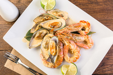 Shrimps and mussels in a creamy sauce, ready-made dish, Asian cuisine, seafood, menu, restaurant