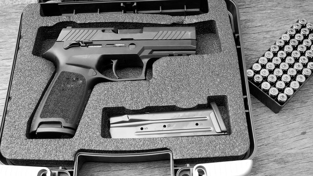 ammunition and gun in Safety box