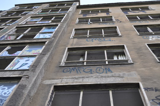 OMFG written on derelict building