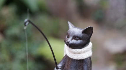 釣りをする猫