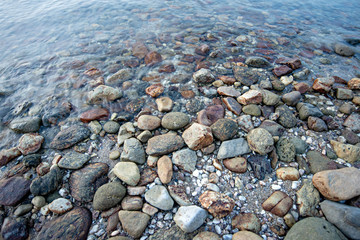 Rocks on the beach at sunset. feel relax. closeup and selective focus. 