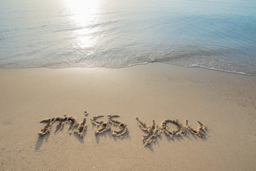 sand beach in the morning sunrise and there is a letter that miss you. an idea of Lonely and nostalgic