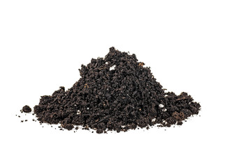 Pile of wet soil isolated on white background. Black soil.