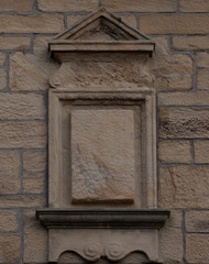 empty stone carving on wall