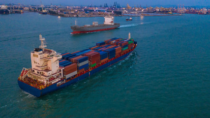 Cargo freight ship carrying container box for import and export business logistic and...