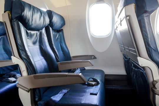 Left armchairs in a built-in chairs Aircraft Cabin Economy class