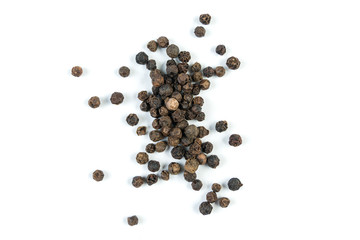 heap of black pepper peppercorns isolated on white background