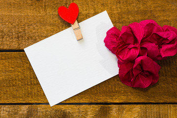 white card with a paper flowers to place the text