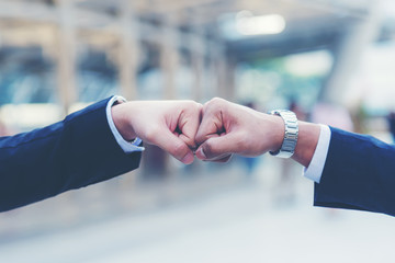 Close up hands businessman and partner working of business people join hand together and start up...