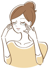 目元パックをする女性